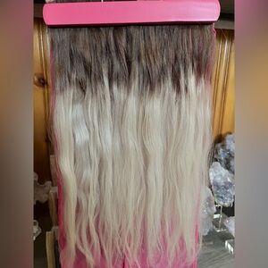 Blonde tape-in hair extensions